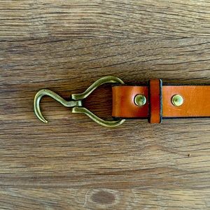 Men’s brown belt by Rye 51.  Unique buckle design. Size 36.